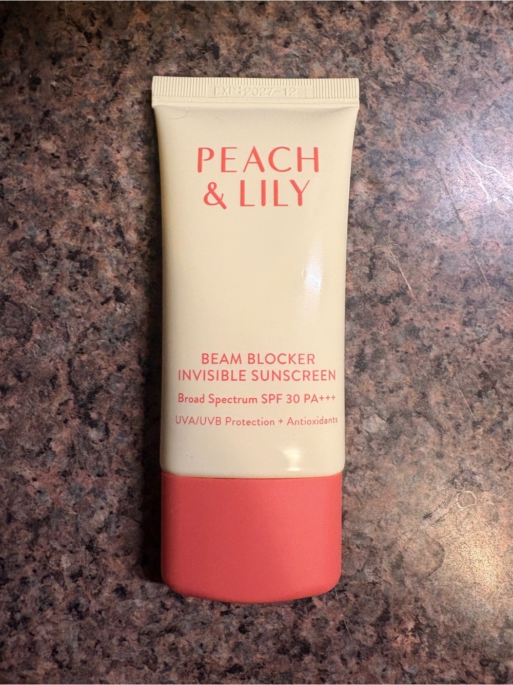 Peach & Lily Beam Blocker Invisible Sunscreen - White & Coral